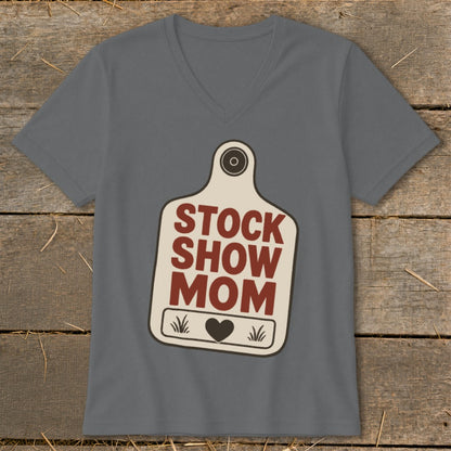 Gray v-neck t-shirt with a cream-colored tag graphic reading "STOCK SHOW MOM".