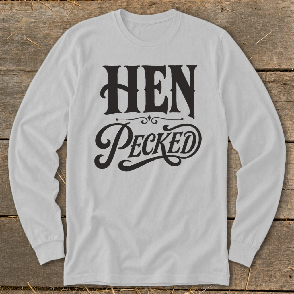 White long-sleeve shirt with black text "HEN Pecked" across the chest.