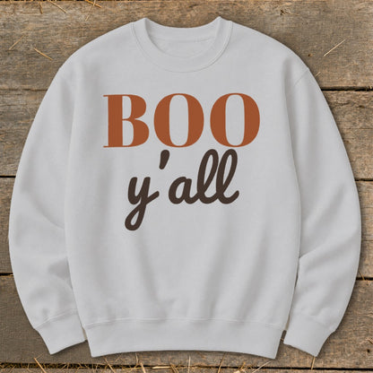 White sweatshirt with "BOO y'all" text in orange and brown.