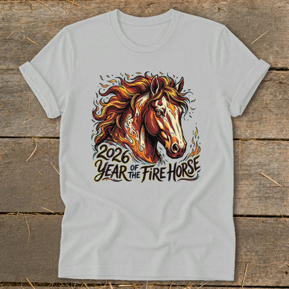 Light gray t-shirt with fiery horse design and text "2026 Year of the Fire Horse."