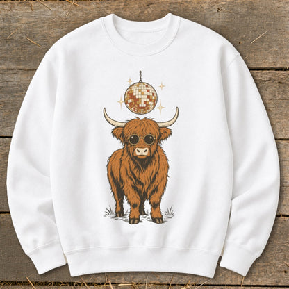 White sweatshirt with a fluffy brown cow wearing sunglasses and a disco ball.