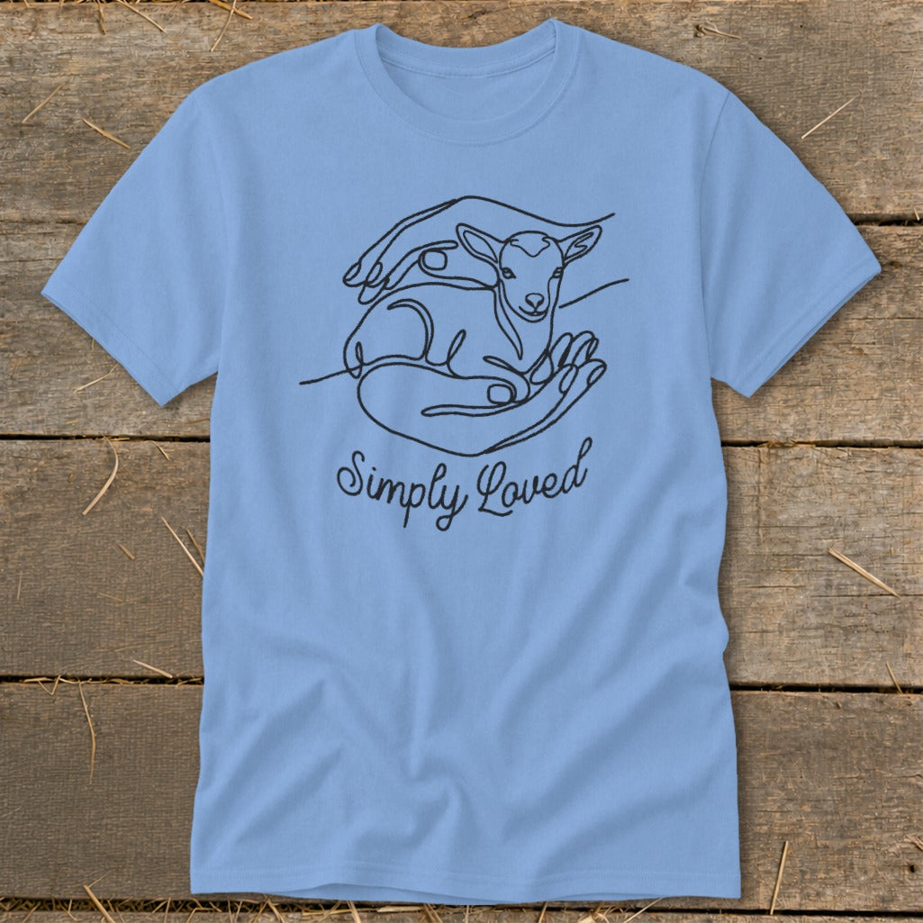 Light blue t-shirt with line art of hands holding a lamb and the text "Simply Loved".