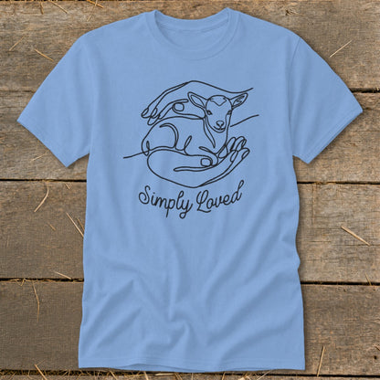 Light blue t-shirt with line art of hands holding a lamb and the text "Simply Loved".