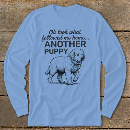 Light blue long sleeve shirt with a puppy graphic and text "Oh look what followed me home... ANOTHER PUPPY".