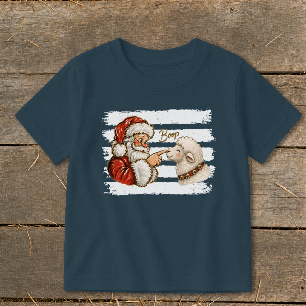 Santa booping a sheep with the word "Boop" written above.