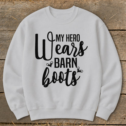 White sweatshirt with black text reading "My Hero Wears Barn Boots."