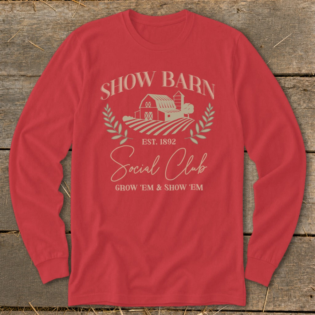 Red long-sleeve shirt with "Show Barn Social Club Grow 'Em & Show 'Em" text.