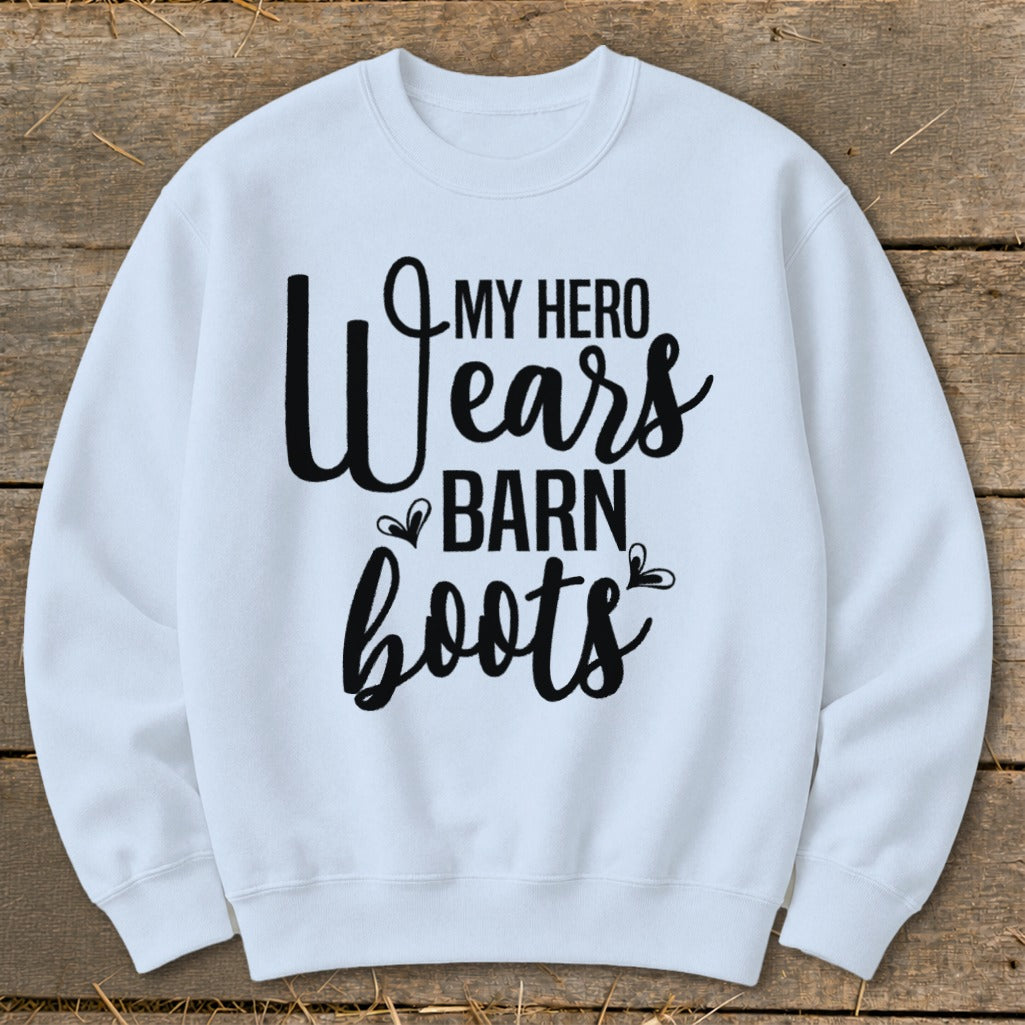 White sweatshirt with black text: "MY HERO Wears BARN boots"