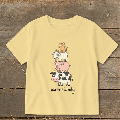 Yellow t-shirt with cartoon barn animals stacked and text "barn family".