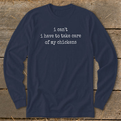 Navy long sleeve shirt with white text: "i can't i have to take care of my chickens"