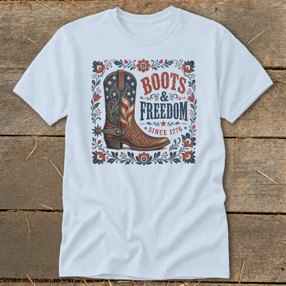 Light blue t-shirt with a patriotic boot design and text "Boots & Freedom Since 1776".