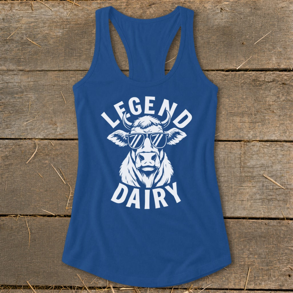 Blue tank top with a white graphic of a cow wearing sunglasses and text "LEGEND DAIRY".