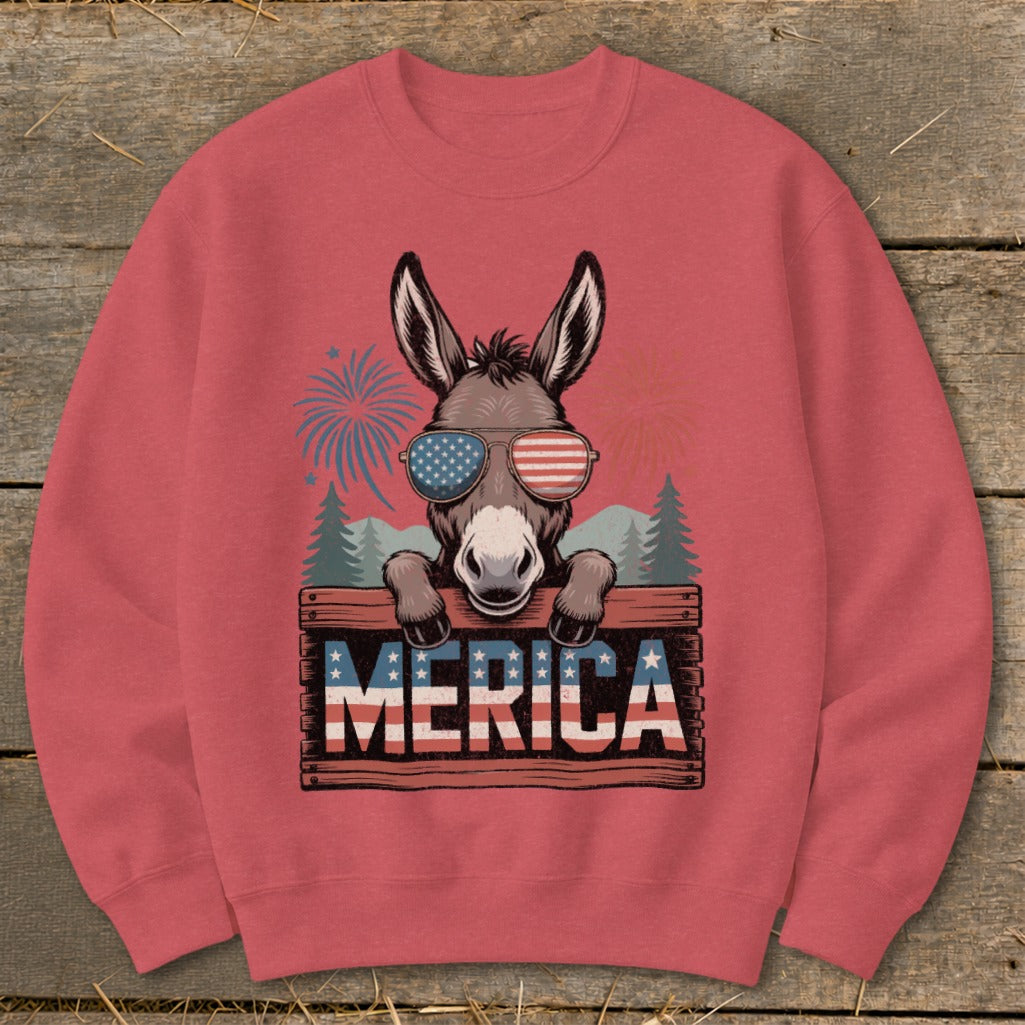 Donkey wearing American flag sunglasses and holding a sign that says MERICA.