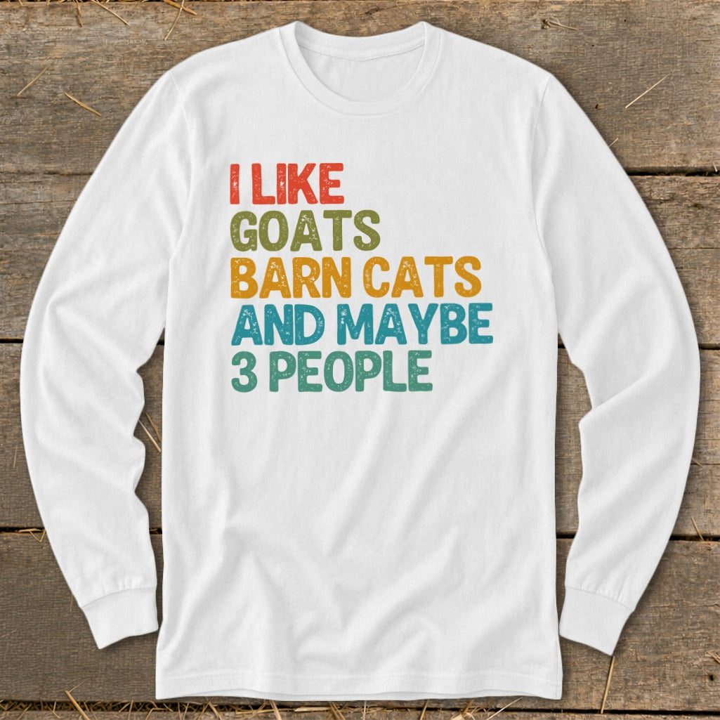 White long-sleeved shirt with text "I like goats barn cats and maybe 3 people".