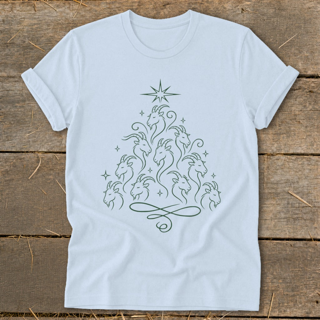 White t-shirt with a minimalist green line drawing of goats forming a Christmas tree shape.