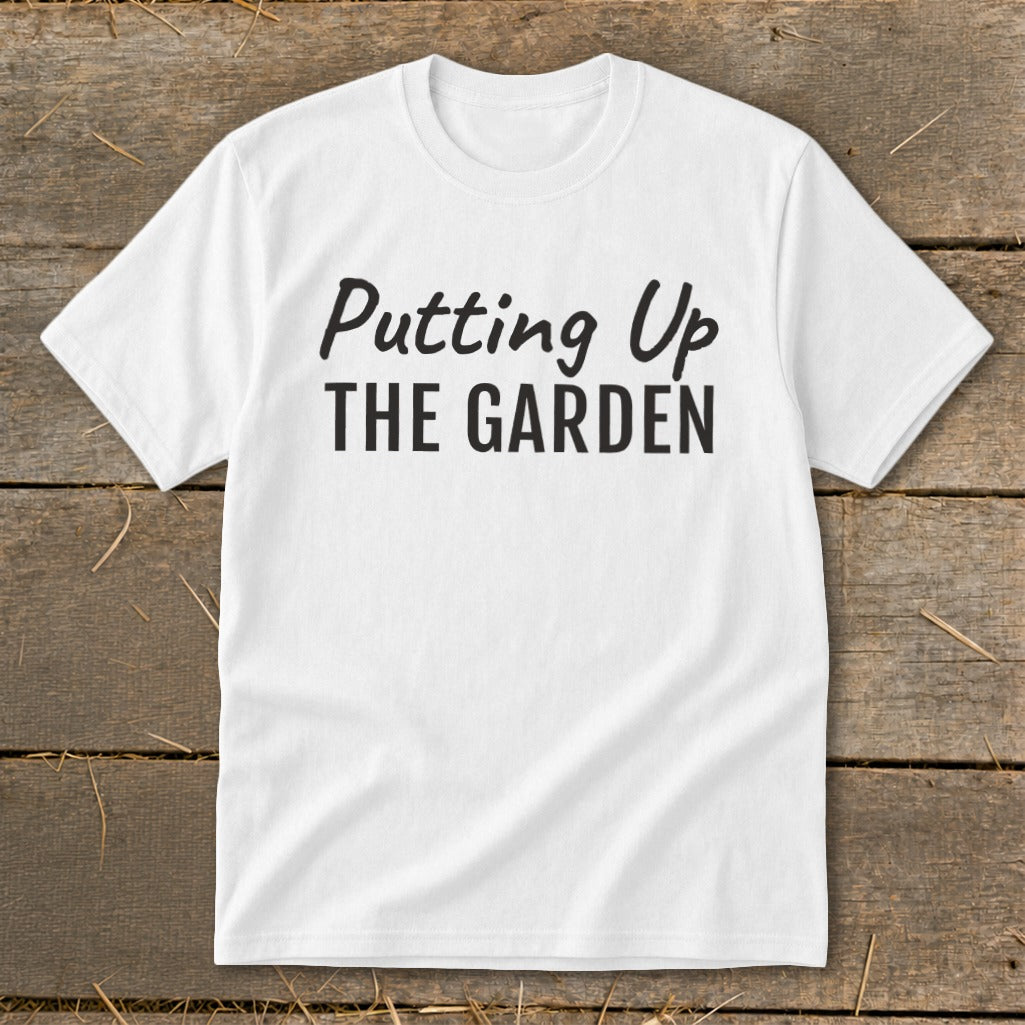 White t-shirt with "Putting Up THE GARDEN" text in black.