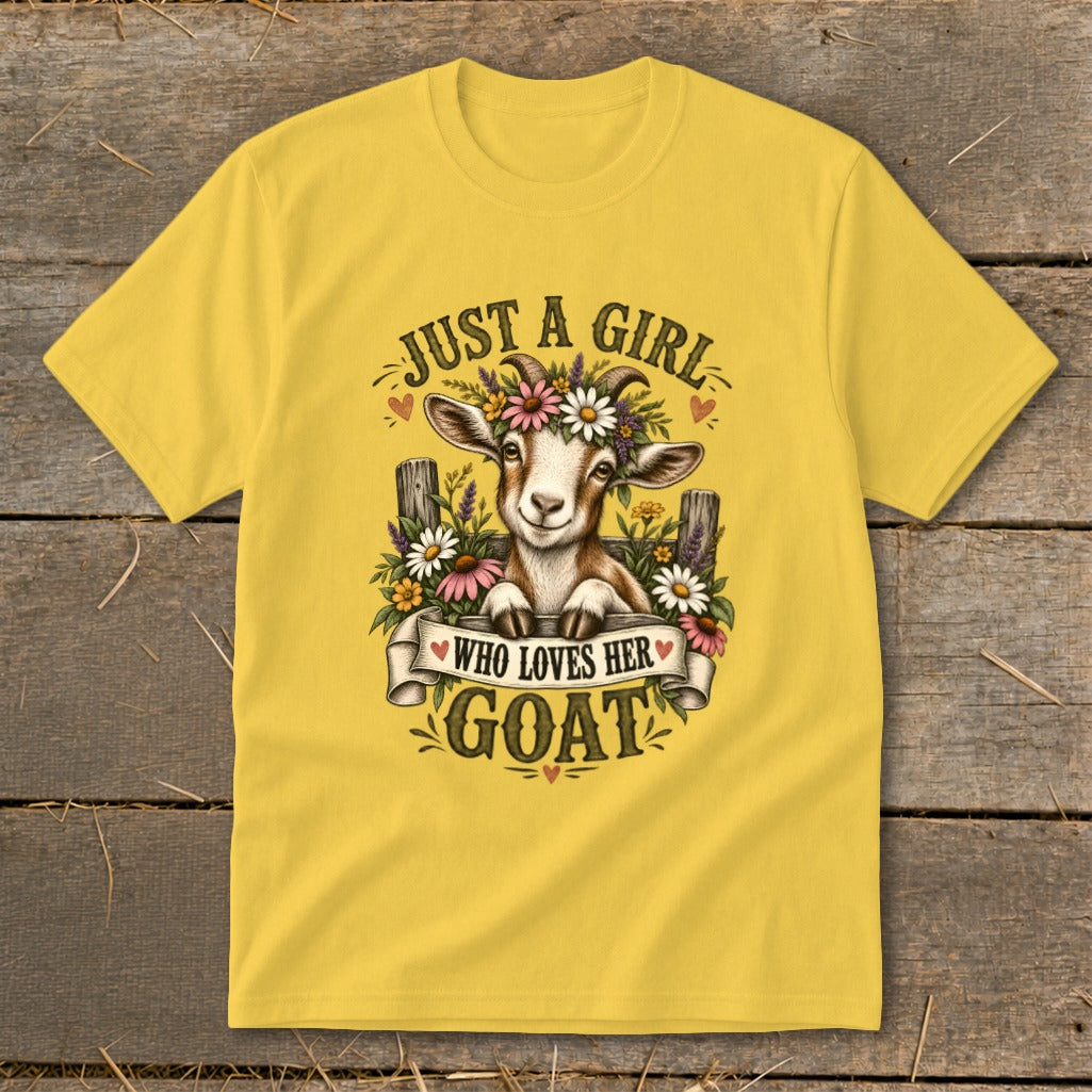 Yellow t-shirt with a goat wearing flowers and text reading "Just a girl who loves her goat."