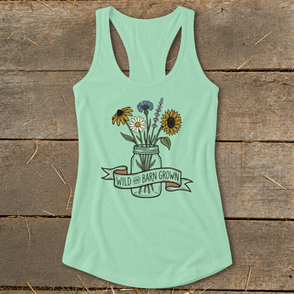 Mint tank top with a floral arrangement in a mason jar and "Wild and Barn Grown" text.