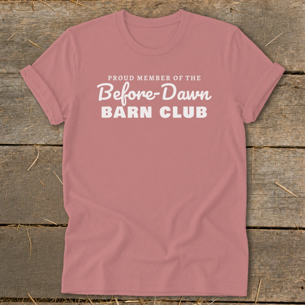Pink t-shirt with white text "PROUD MEMBER OF THE Before-Dawn BARN CLUB".