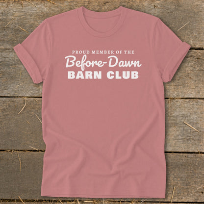 Pink t-shirt with white text "PROUD MEMBER OF THE Before-Dawn BARN CLUB".