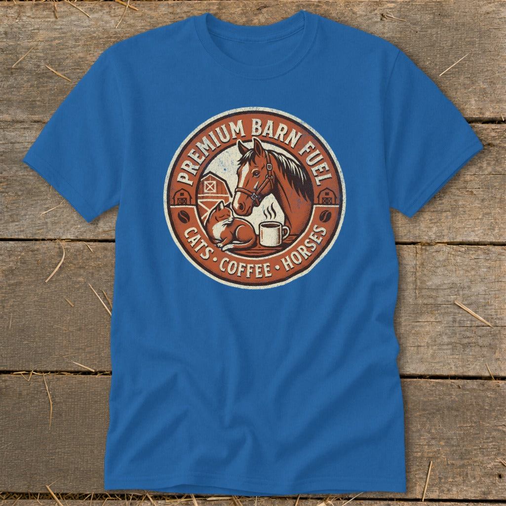 Blue t-shirt with circular barn design featuring a horse, cat, coffee, and text.