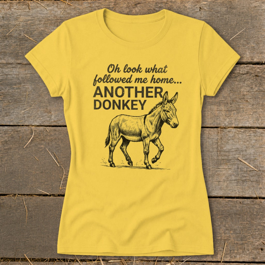 Yellow t-shirt with sketch of donkey and text "Oh look what followed me home... ANOTHER DONKEY".