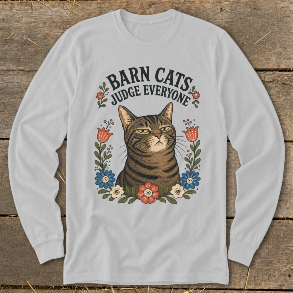 Light gray long sleeve shirt with a tabby cat surrounded by flowers and text "BARN CATS JUDGE EVERYONE."