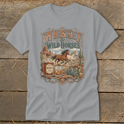 Whiskey & Wild Horses graphic with horses, whiskey bottle, and glass on desert landscape.
