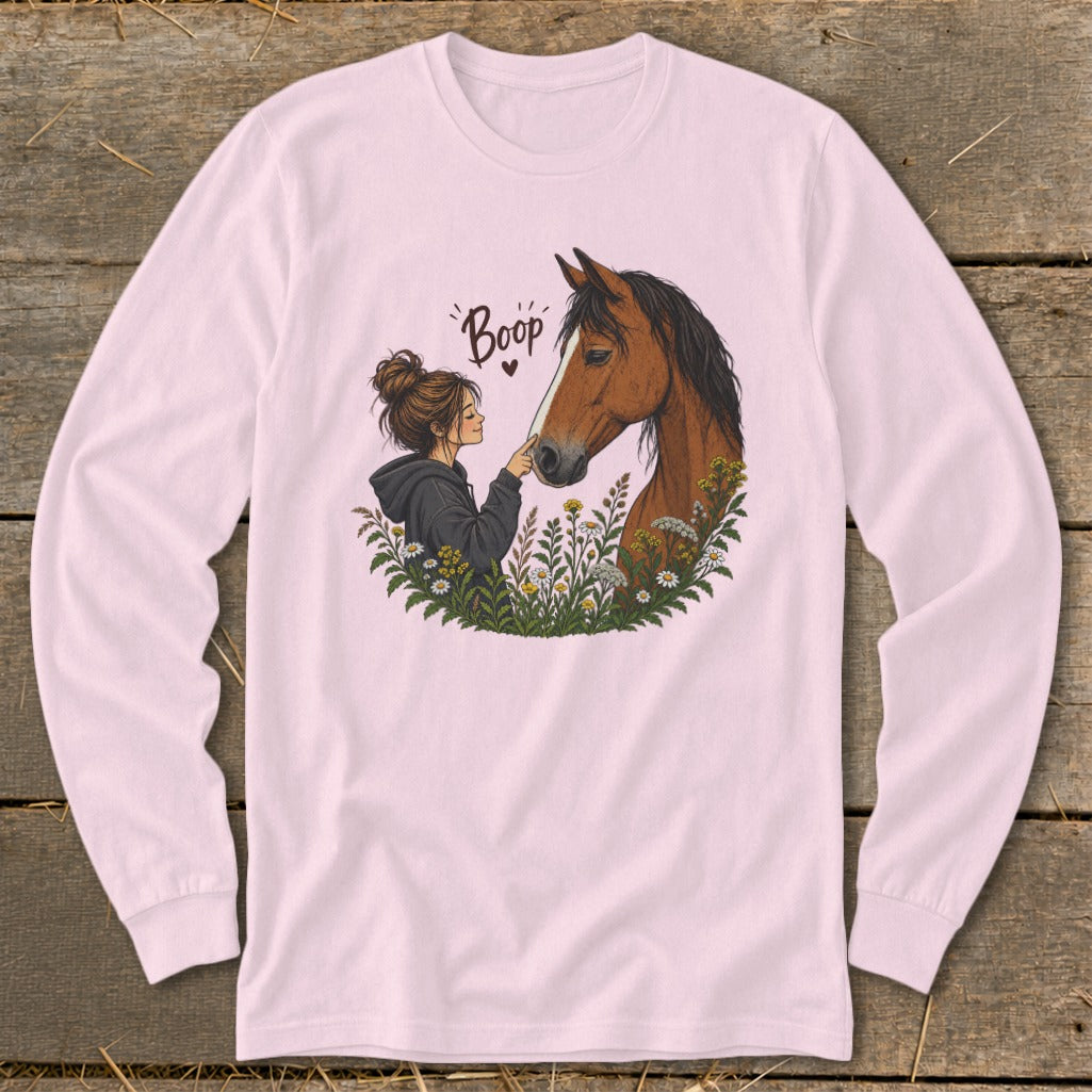 Illustration of a girl touching a horse's nose, with "Boop" text and flowers.