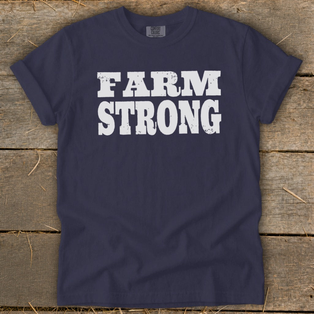 Dark blue short-sleeve t-shirt with distressed white text reading FARM STRONG displayed across the chest.