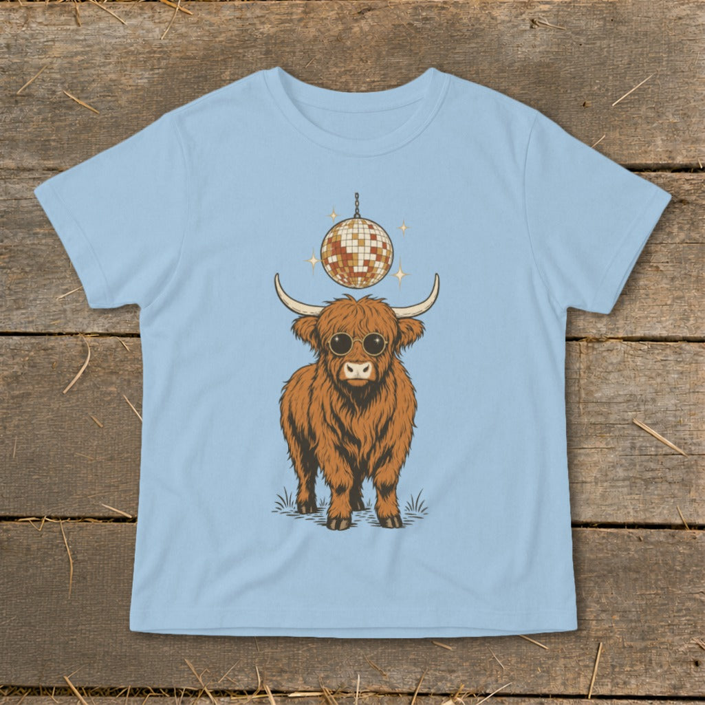 Highland cow with sunglasses and disco ball on light blue t-shirt.