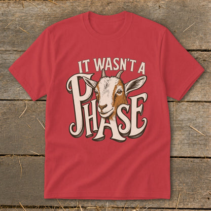 Red t-shirt with goat graphic and text "IT WASN'T A PHASE".