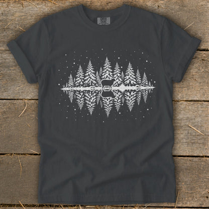 Dark grey t-shirt with white graphic of pine trees reflected in water with sheep silhouette.