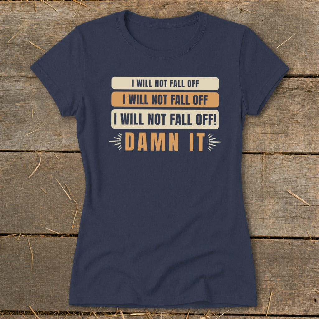 Navy t-shirt with "I WILL NOT FALL OFF" and "DAMN IT" text graphic.