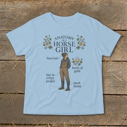 Light blue t-shirt with "Anatomy of a Horse Girl" graphic and illustrations.