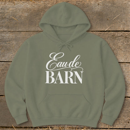 Green hoodie with white text "Eau de BARN" on the chest.