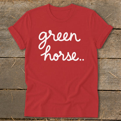 Red t-shirt with white script text "green horse..."