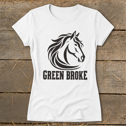 A white short-sleeved t-shirt features a black horse head graphic above the text "GREEN BROKE".