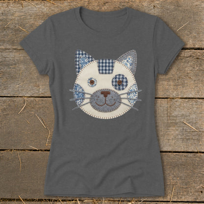Gray t-shirt with a patchwork cat face applique featuring blue and white patterns.