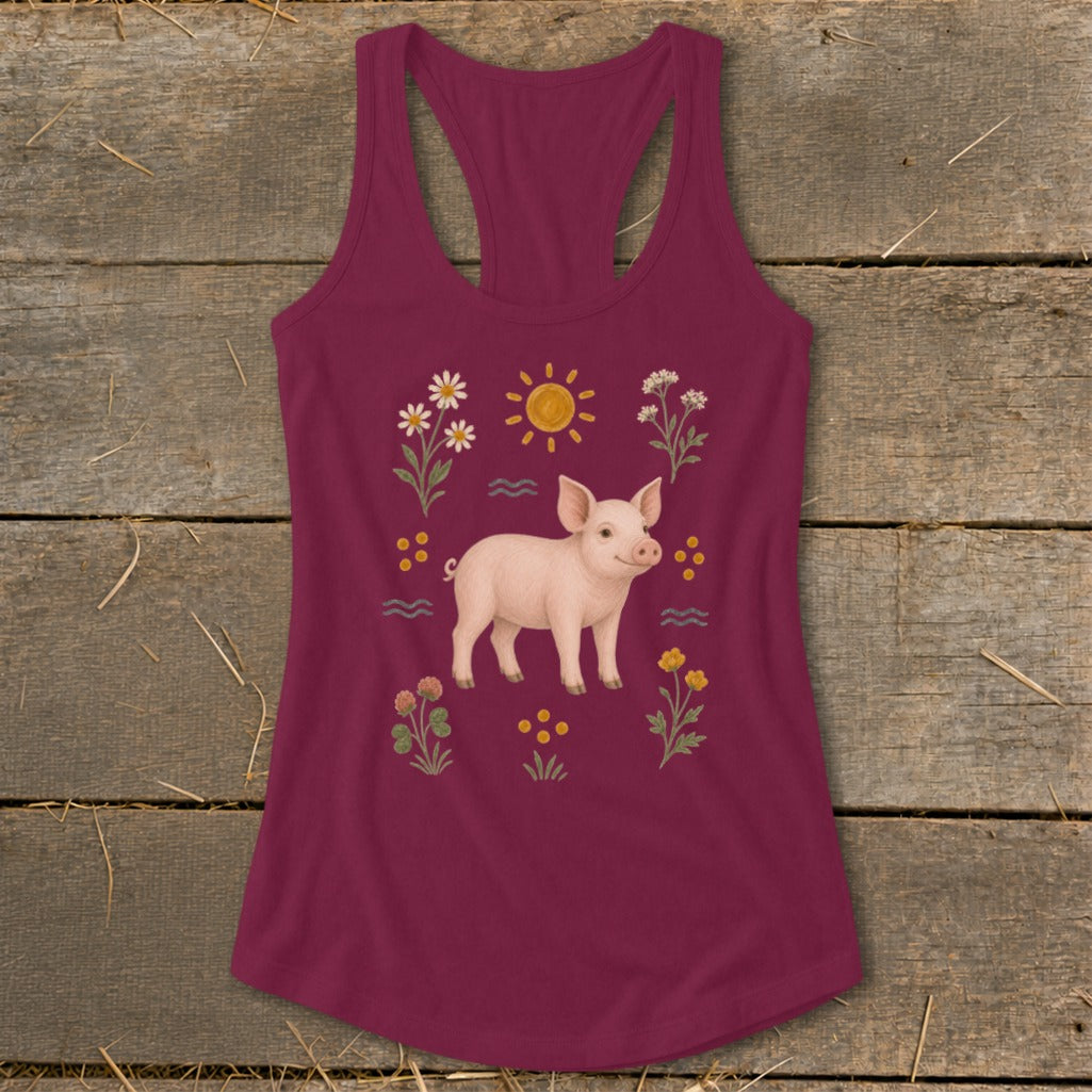 Burgundy tank top with a pig illustration surrounded by flowers, sun, and waves.