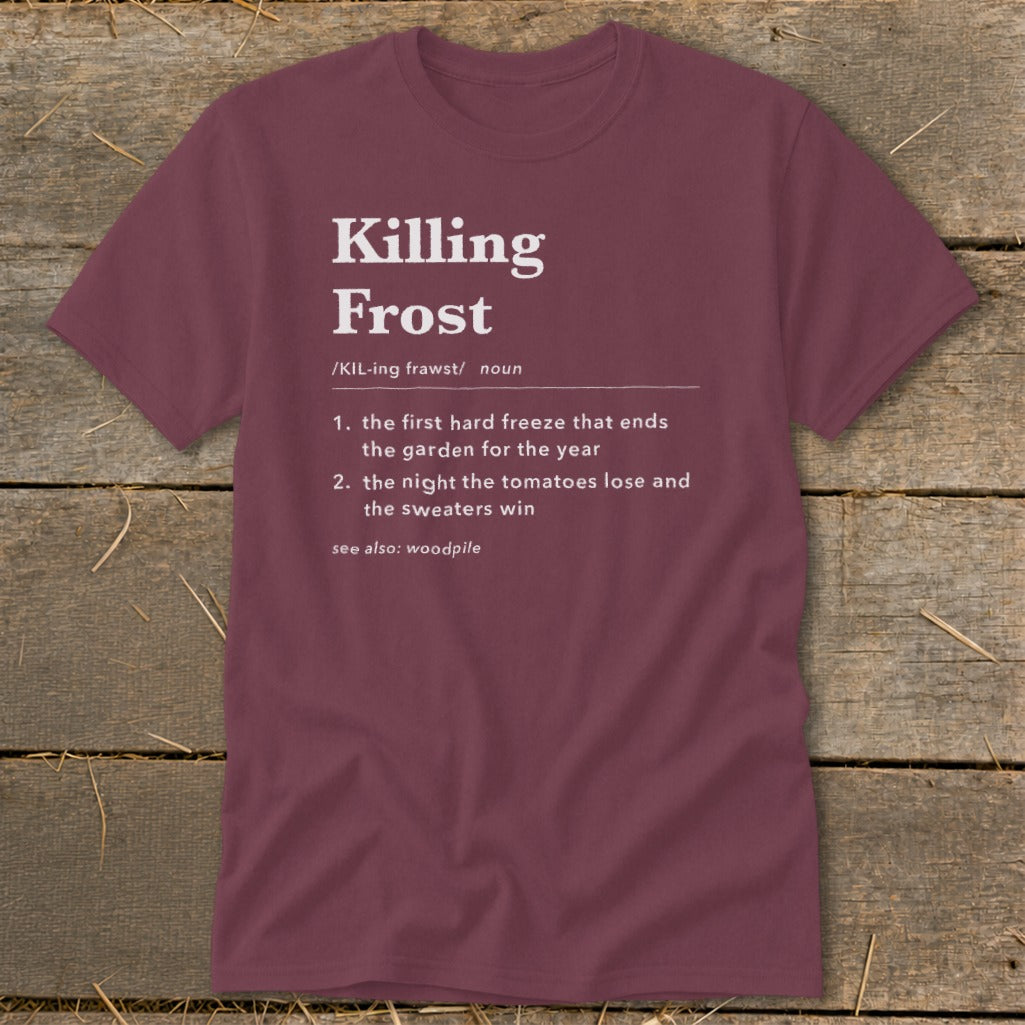 Maroon t-shirt featuring white text that defines Killing Frost with gardening and sweater humor.
