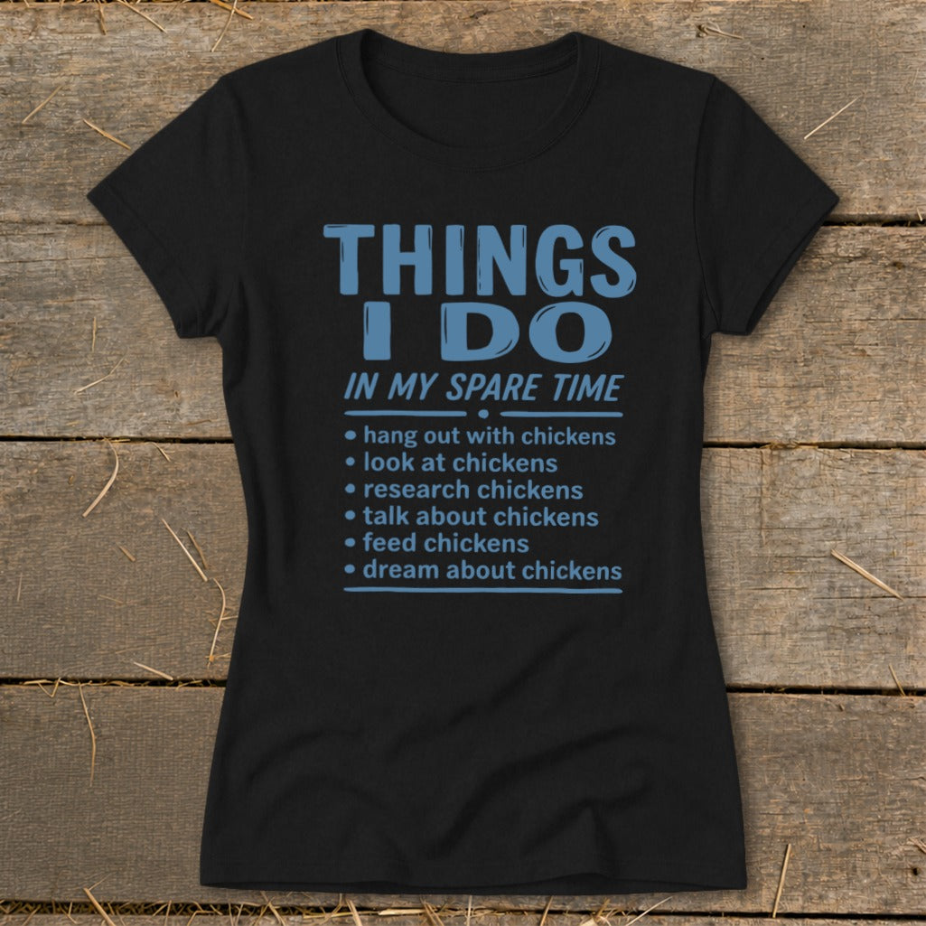 Black t-shirt with blue text listing chicken-related activities.