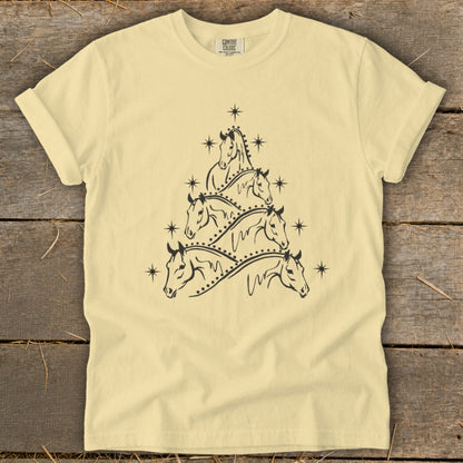 Cream t-shirt with black Christmas tree made of horse heads and stars.