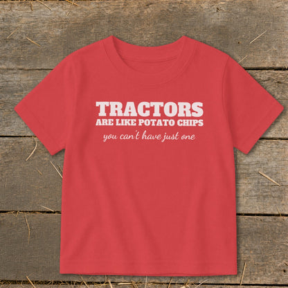 Red t-shirt with white text: "TRACTORS ARE LIKE POTATO CHIPS you can't have just one."
