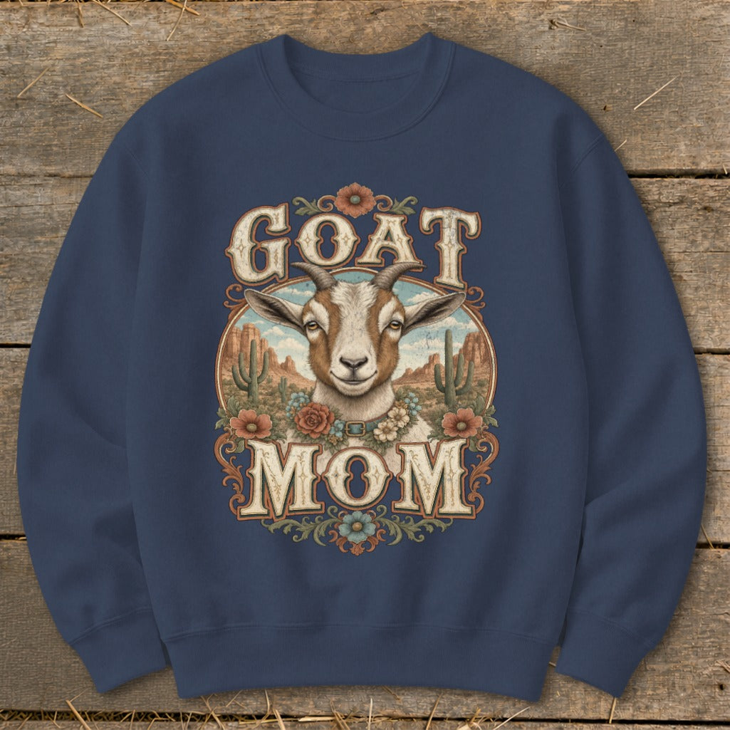 Crewneck sweatshirt with "Goat Mom" text and goat graphic in a desert scene.