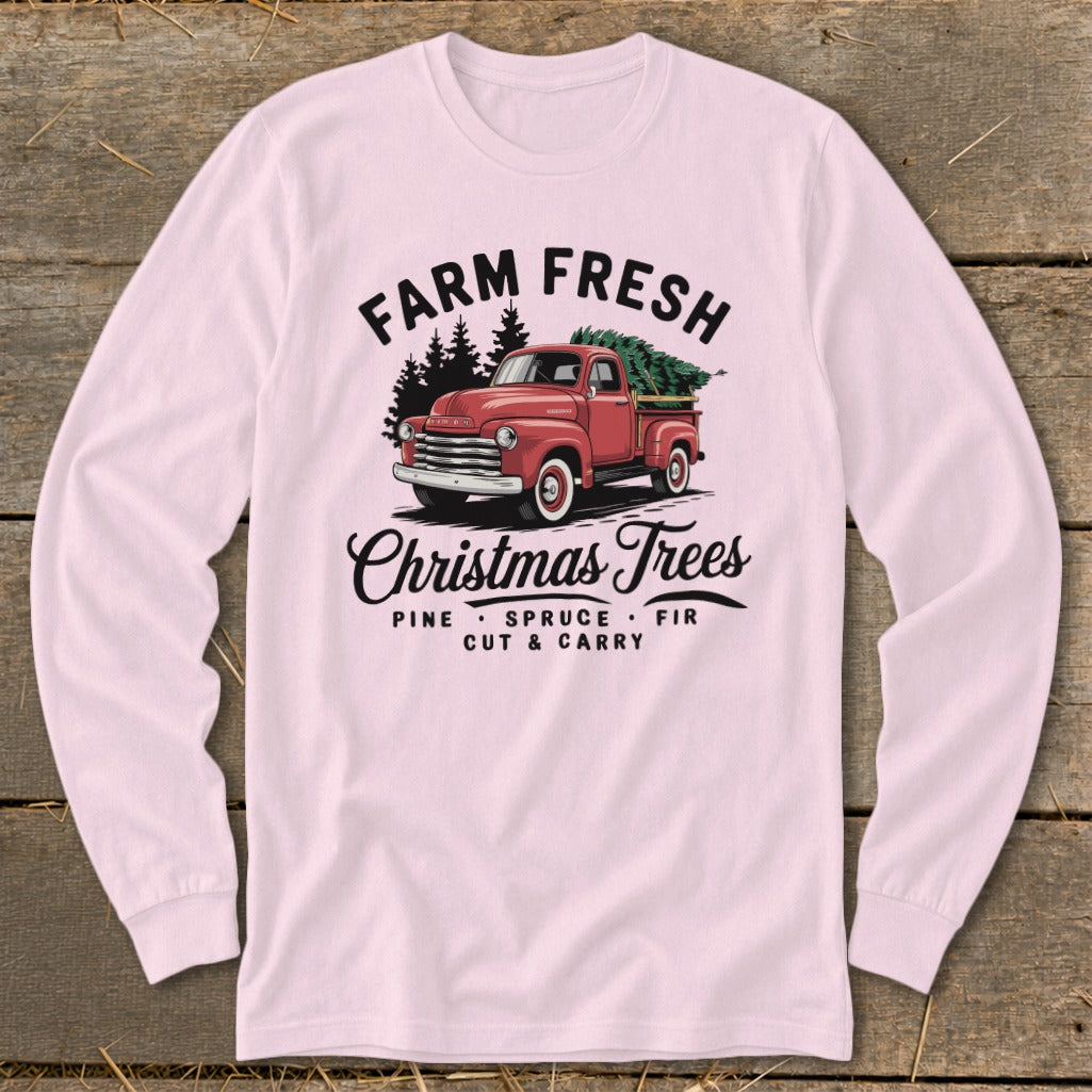 Red vintage truck with Christmas trees, "Farm Fresh Christmas Trees" text.