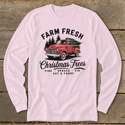 Red vintage truck with Christmas trees, "Farm Fresh Christmas Trees" text.