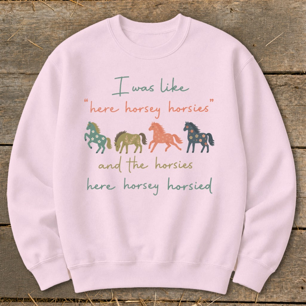 Pink sweatshirt with horses and text: "I was like 'here horsey horsies' and the horsies here horsey horsied"