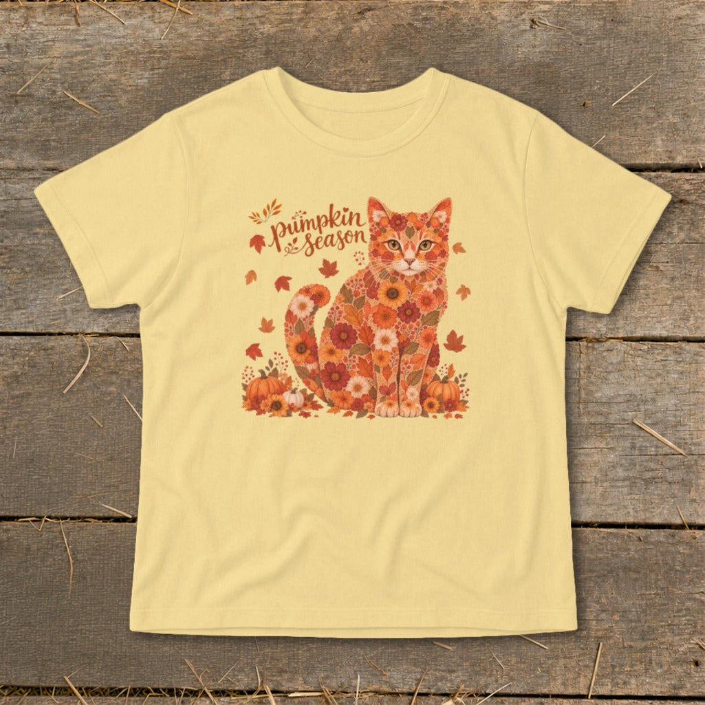 Yellow t-shirt with a floral cat and "Pumpkin Season" text surrounded by leaves.