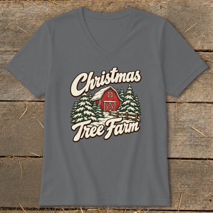 Christmas Tree Farm graphic with a red barn and snow-covered pine trees.
